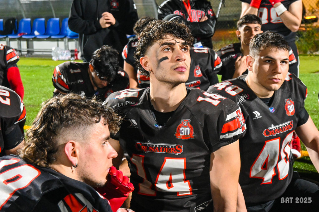 Il qb Federico Dessì ascolta il suo coach (Foto Battista Battino)